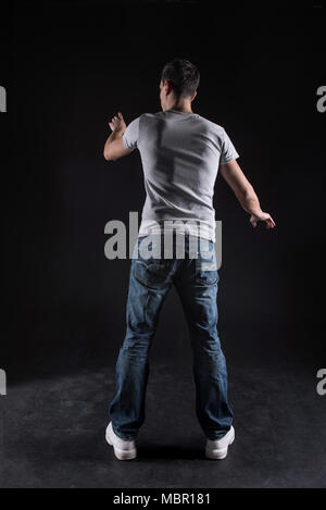 Smart young programmer multitasking Stock Photo