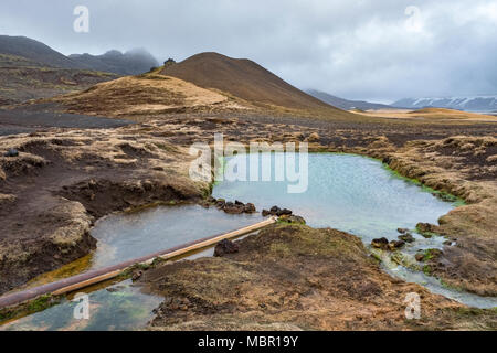 Reykjanes peninsula, Iceland. A peaceful warm pool or hot pot in the hills near the active geothermal area of Seltun Stock Photo