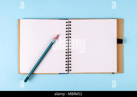 Open notebook and pencil with space for text Stock Photo