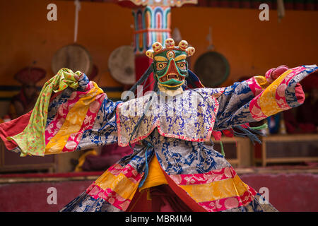 Unidentified monk in mask perform a religious masked and costumed mystery dance of Tibetan Buddhism during the Yuru Kabgyat Buddhist festival at Lamay Stock Photo