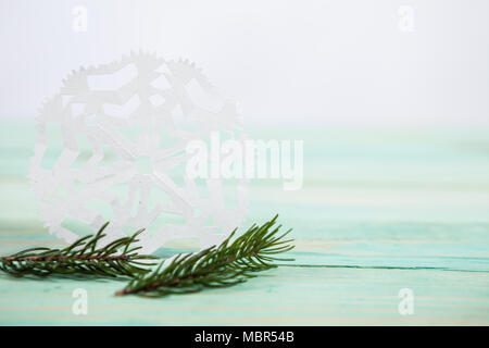 Paper snowflake and tied with twine Stock Photo