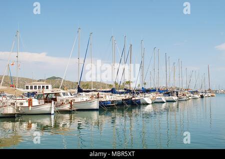 Sailing boats moored in the marina at Puerto Pollensa on the Spanish island of Majorca on September 4, 2017. Stock Photo