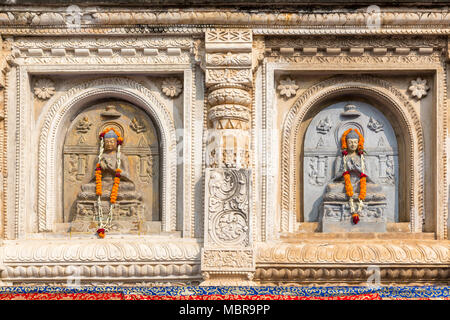 Buddha sculptures in the facade of the Mahabodhi Temple, Bodhgaya, Bihar, India Stock Photo