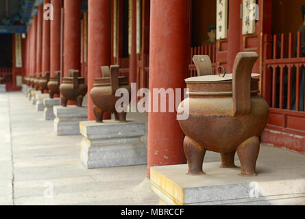 Only the foremost urn in focus on a cloister in Dongyue temple in eastern central Beijing, China Stock Photo