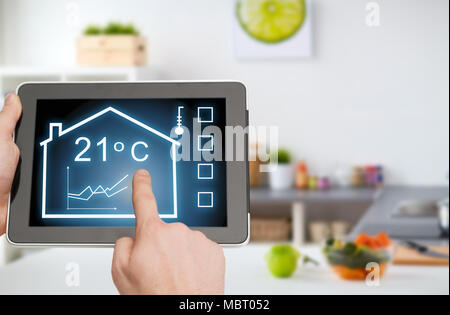 tablet pc with smart home settings on screen Stock Photo