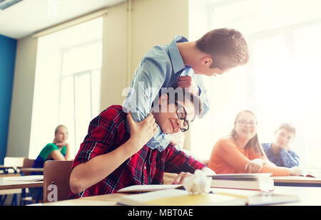 student boy suffering of classmate mockery Stock Photo