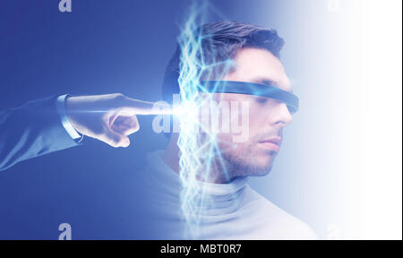 businessman hand connecting to virtual network Stock Photo