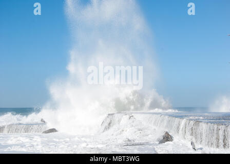 Wave that breaks on the pier - Italy Stock Photo