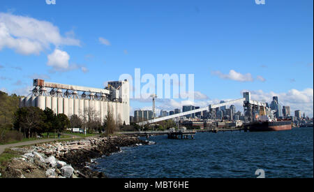View of Seattle skyline behind the grain elevator in Elliot Bay. Stock Photo