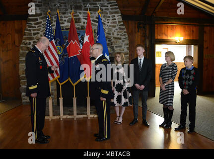 Maj. Gen. Andrew Schafer, Jr., Commanding General, 28th Infantry Division, administers the oath of office to Brig. Gen. Stephen Radulski, Assistant Division Commander, Maneuver, during his promotion ceremony held at Fort Indiantown Gap, Pa. on Jan. 6. Stock Photo