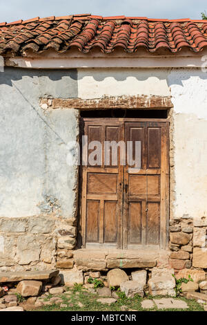 Old house brick wall tile roof India Stock Photo - Alamy
