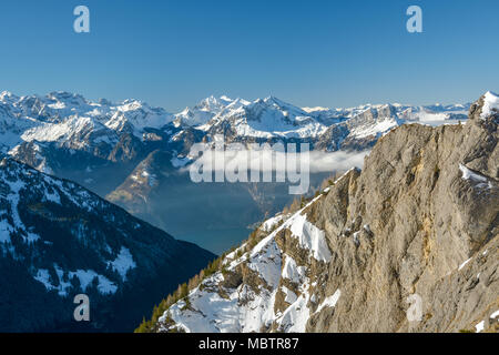 Beautiful view on snowy Swiss Alps from Klingenstock near Stoos, Switzerland Stock Photo