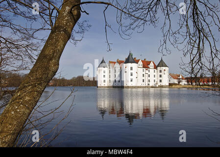 Glücksburg, Germany - April 7th, 2018 - Castle Glücksburg reflecting in the lake Stock Photo