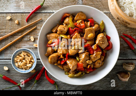 Delicious Kung Pao Chicken with peppers, celery and peanuts. Stock Photo