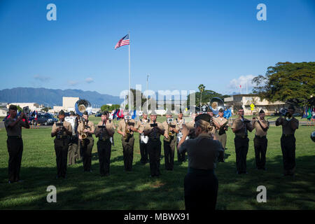 U.S. Marines with the Marine Corps Forces, Pacific band perform during the Headquarters Battalion, Marine Corps Base Hawaii relief and appointment ceremony, Jan. 12, 2018. Sgt. Maj. Robert C. Ixtlahuac relieved Sgt. Maj. Phillip J. Billiot as the sergeant major for Headquarters Battalion, Marine Corps Base Hawaii. (U.S. Marine Corps photo by Sgt. Alex Kouns) Stock Photo