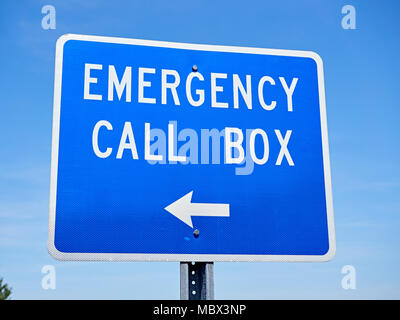 Emergency call box sign pointing in the direction of a communication box that notifies a 911 operator of trouble or an emergency in Alabama USA. Stock Photo