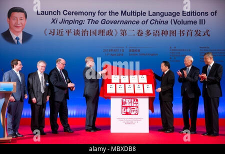 London, London, UK. 11th Apr, 2018. Britain's Prince Andrew (4th L), the Duke of York, unveils the multilingual versions of the second volume of 'Xi Jinping: The Governance of China' with Jiang Jianguo (3rd R), minister of China's State Council Information Office, at the launch ceremony in London, Britain on April 11, 2018. The book was launched in London Wednesday. Credit: Isabel Infantes/Xinhua/Alamy Live News Stock Photo