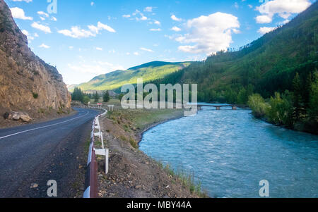 Mountain landscape. The Chuya River and the Chuyskiy highway highway in the Altai Republic. Stock Photo