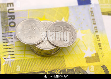 Euro money raise concept, arrow chart pointing up against background of Euro bills Stock Photo