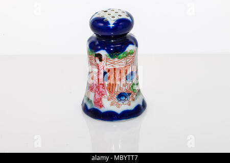 a blue hand painted scene on a salt shaker Stock Photo