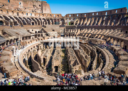 ROME, ITALY - APRIL 24, 2017. Inside view of The Colosseum with tourists sightseeing. Stock Photo