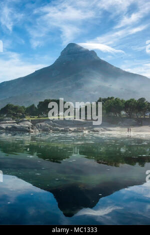 Lion's Head reflection in ocean, Camp's Bay, Cape Town, South Africa Stock Photo