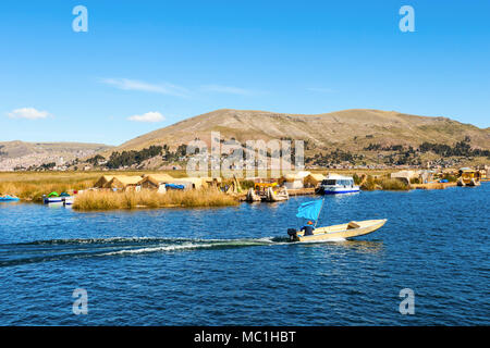 Titicaca is a large, deep lake in the Andes on the border of Peru and Bolivia Stock Photo