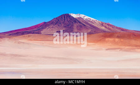 Volcano and lake on the bolivian Altiplano Stock Photo