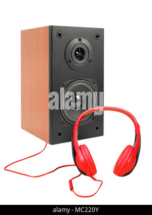 Music and sound - Front view line array loudspeaker enclosure cabinet and red headphone isolated on a white background. Stock Photo