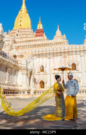 Traditional Burmese marriage in front of the 'Ananda Temple' in Bagan, Myanmar (Burma).