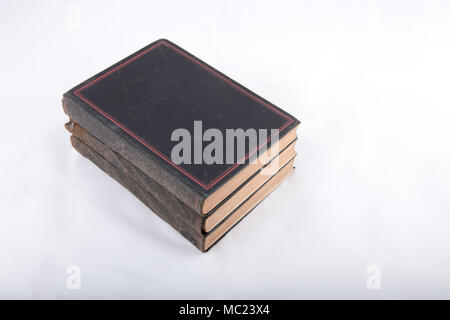 High angle  view of ancient books on white surface with copy space, High resolution picture Stock Photo