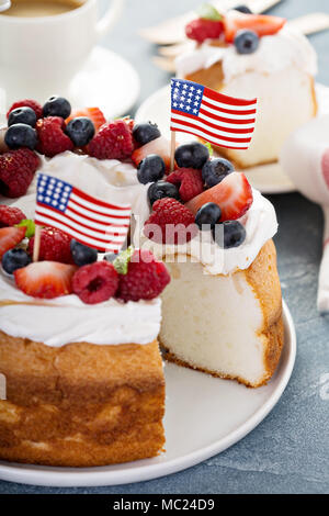 Angel food cake with cream and berries Stock Photo