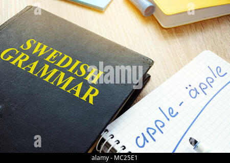 Book with title Swedish grammar and notebook Stock Photo