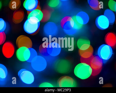 Colorful Christmas lights bokhe on black background Stock Photo