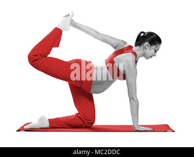 Pregnant woman making exercise, isolated Stock Photo