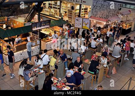 bar & crowded seating area of food court The Mercato Centrale or Mercato di San Lorenzo - Central Food Market  Florence - Tuscany, Italy - Italy Stock Photo