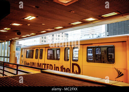 The Detroit People Mover leaves the station in downtown Detroit. The People Mover is a mass transit rail system that loops through the city with sever Stock Photo