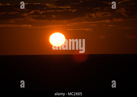 Sunset over the ocean Stock Photo