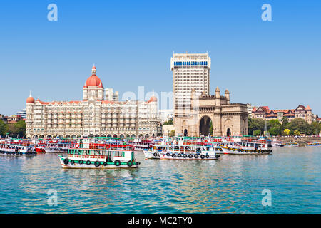 MUMBAI, INDIA - FEBRUARY 21: The Taj Mahal Palace Hotel and Gateway of India on Febuary 21, 2014 in Mumbai, India. Stock Photo