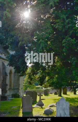 Graveyard at the Church of Saint Laurence in Stanwick, Northamptonshire Stock Photo