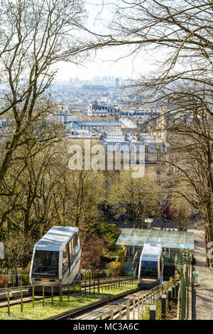 The Montmartre funicular, run by the RATP company, makes it possible to go down the hill in seconds without walking down the 222 steps of the stairs. Stock Photo