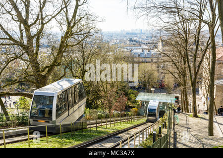 The Montmartre funicular, run by the RATP company, makes it possible to go down the hill in seconds without walking down the 222 steps of the stairs. Stock Photo