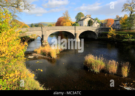 Autumn, the Stone road bridge over River Kent, Kendal town, Cumbria, England, UK Stock Photo