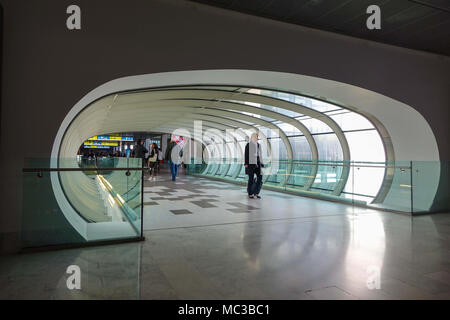 Pedestrian tunnel with people walking through, Toulouse Blagnac airport, France Stock Photo