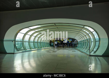 Pedestrian tunnel with people walking through, Toulouse Blagnac airport, France Stock Photo