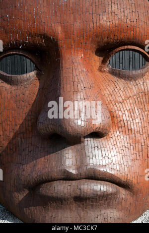 The 'Bulkhead' mask by Rick Kirby outside the Marlowe Theatre, Canterbury, Kent, UK. Stock Photo