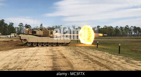 Troopers with Delta Tank Company, 6th Squadron, 8th Cavalry Regiment, 2nd Armored Brigade Combat Team, 3rd Infantry Division, fire their main gun round at a target during unit gunnery, March 29 at Fort Stewart, Ga. This gunnery marked the first time 2nd ABCT Troopers fired their newly received M1A1-SA Abrams Tanks since the brigade converted from a light to an armored brigade combat team.