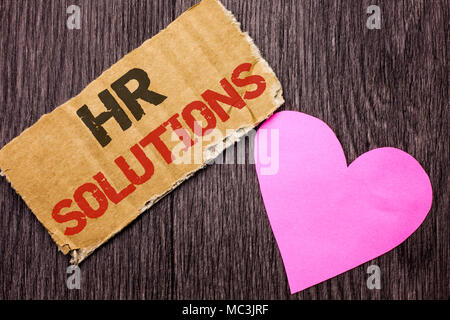 Handwriting text Hr Solutions. Concept meaning Recruitment Solution Consulting Management Solving Onboarding written Cardboard Piece the wooden backgr Stock Photo