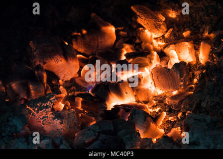 Burning and glowing pieces of wood in Fireplace Stock Photo - Alamy