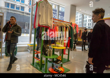 New York, USA. 12th Apr, 2018. Commes des Garcons display within the new Nordstrom Men's Store in Midtown Manhattan in New York on its grand opening day, Thursday, April 12, 20187. The three-story 47,000 square feet store is directly across from the future women's store opening in 2019. The store is Nordstrom's first-ever New York store although it already has two Nordstrom Rack off-price stores. The store is luxe and service oriented even offering around-the-clock pick up of online orders if you must order your Comme de Garcons shirt at 2AM. ( Credit: Richard Levine/Alamy Live News Stock Photo